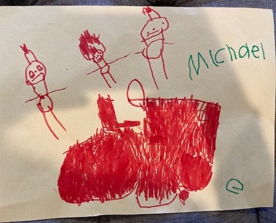 Michael's drawing of a red tractor and him, his grandfather, and brother.