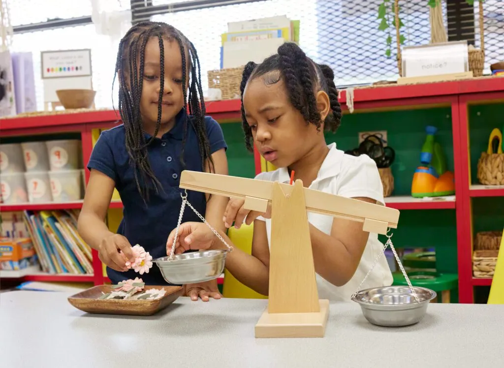 Two students playing in the classroom